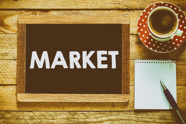 Market handwritten with white chalk — Stock Photo, Image