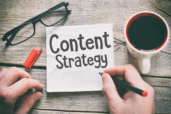 Content strategi handskrift på en servett — Stockfoto