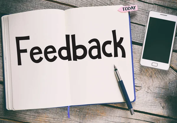 Anteckningar med feedback word — Stockfoto