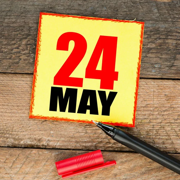 24 Palabra de mayo escrita en un cuaderno — Foto de Stock