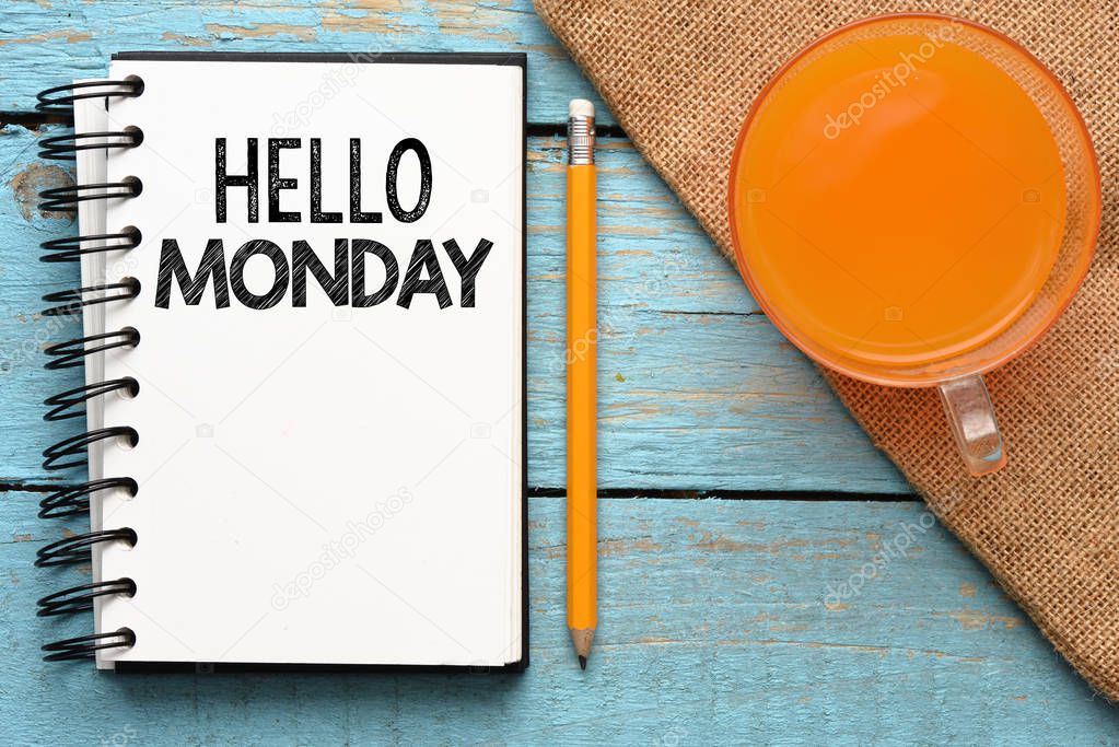 Hello Monday concept on wooden background