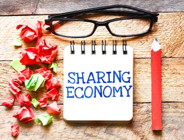 Sharing Economy on notepad, business concept clipart