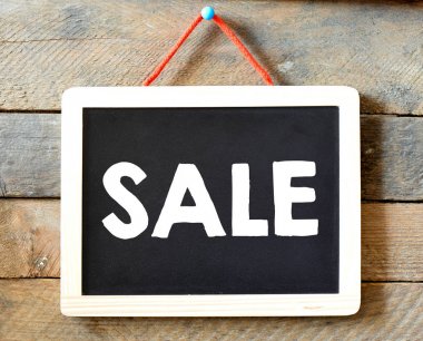 Kara tahta üzerinde Satılık metin