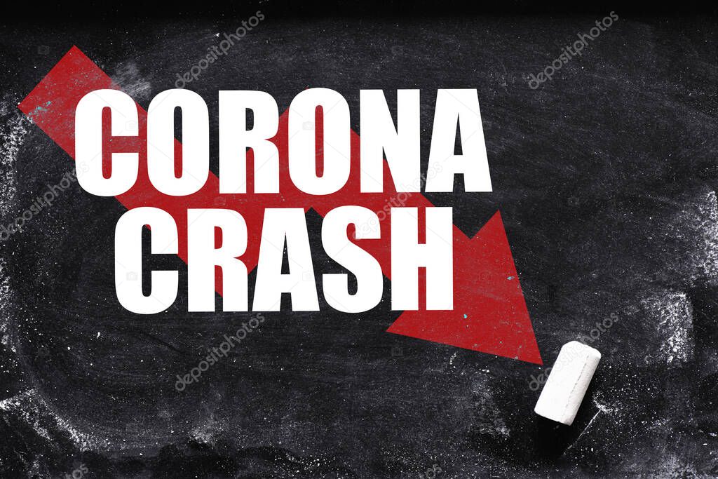 Corona Crash text on chalk board - concept in business. Declines in financial markets caused by the virus in 2020 around the world.