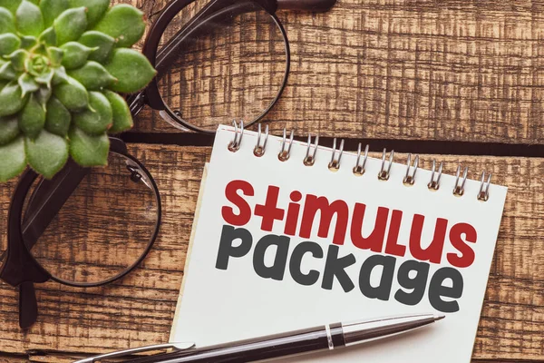 Stimulus Package Bokstäver Skrivna Anteckningsblock Affärsidé — Stockfoto