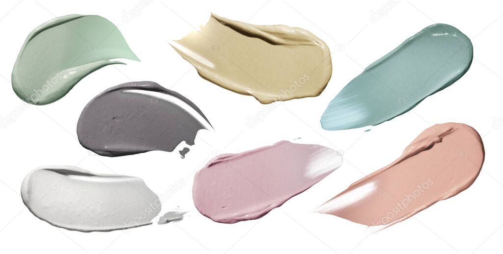 Variety of textures of clay mask cosmetics on a white background