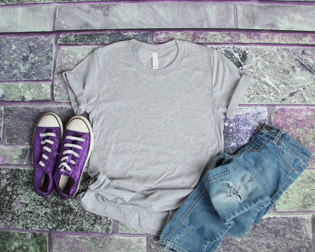 Download Gray T Shirt mockup flat lay on purple brick background ...