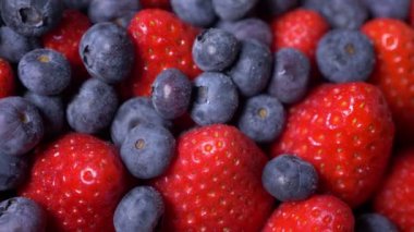 Tasty strawberries with blueberries