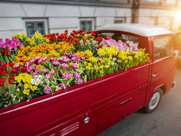 Car loaded with flowers for delivery