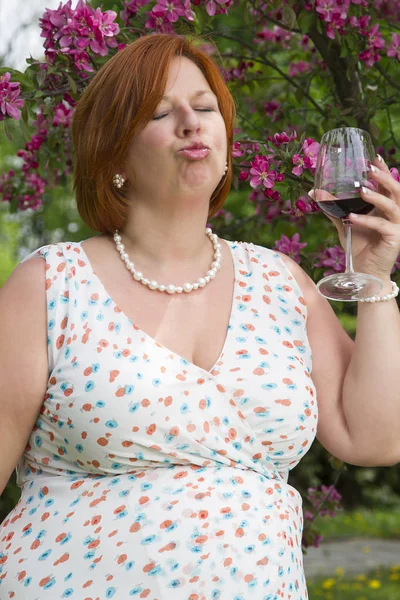 Enjoying her wine — Stock Photo, Image