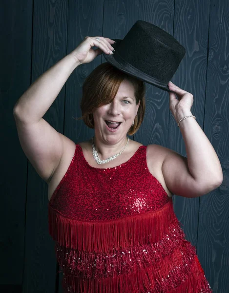 Mujer divertida con un sombrero — Foto de Stock