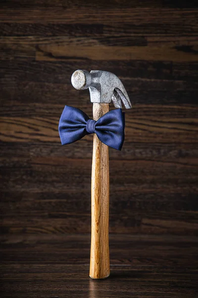 Wood Handle Hammer Wearing Blue Bowtie — Stock Photo, Image