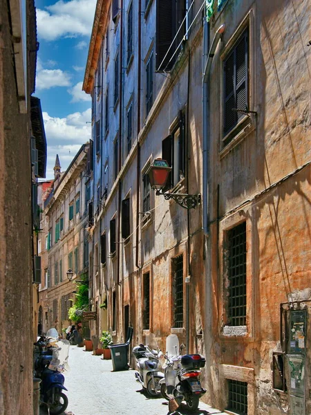 A narrow side street in Rome's ancient district, Rome, Italy