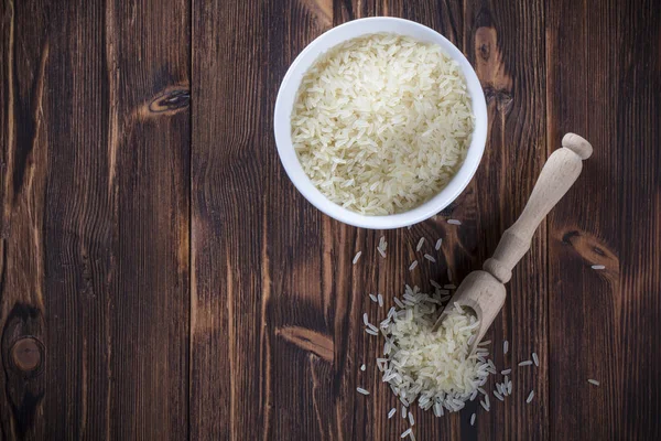 Rice spoon plate Wooden table background