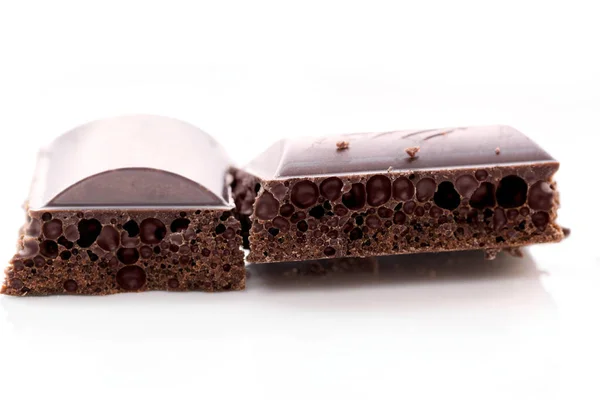 Porowate czarny czekolada — Zdjęcie stockowe