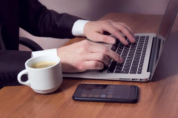 Hands businessman on a laptop — Stock Photo, Image