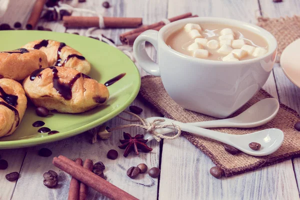 Breakfast of coffee, croissants, cinnamon and anise — Stock Photo, Image