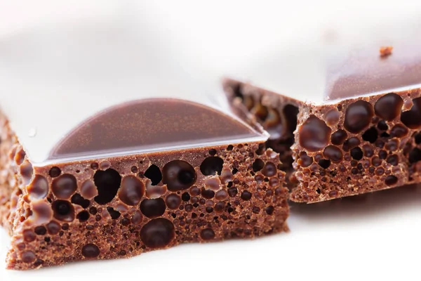 Porous black chocolate — Stock Photo, Image