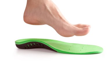 orthopedic insole and female leg above it clipart