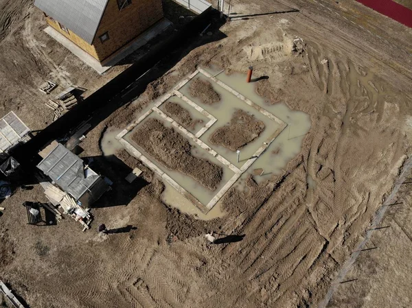 Fondation d'une maison inondée d'eau — Photo