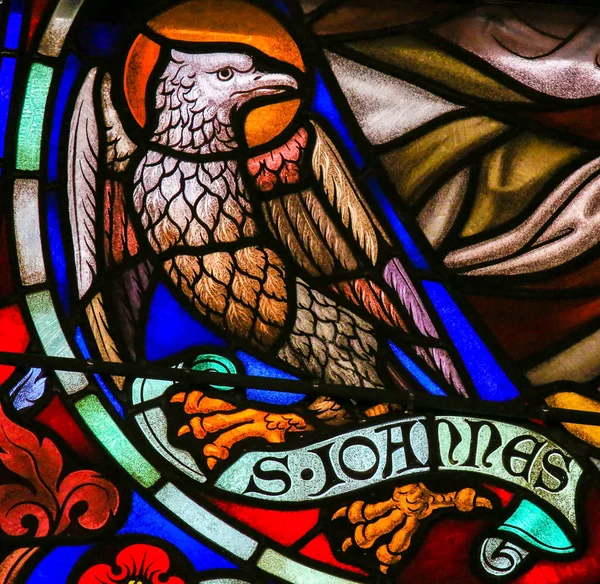 Stained Glass of the the Eagle - Saint John the Evangelist — Stock Photo, Image