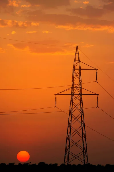 Elektrický sloup při západu slunce — Stock fotografie