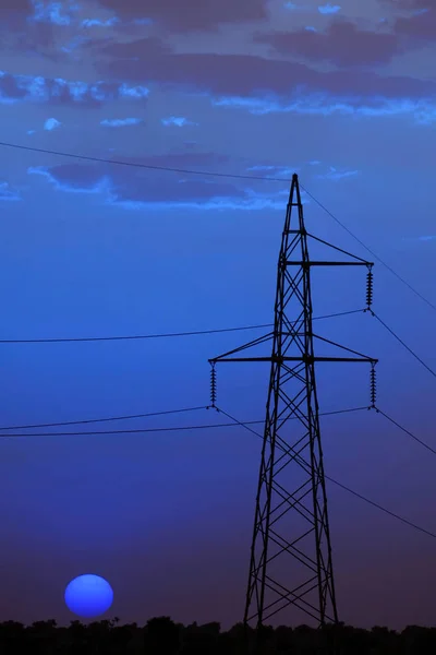 Pilón de electricidad al atardecer —  Fotos de Stock