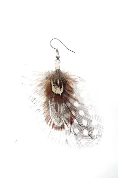 Women's earrings with feathers isolated — Stock Photo, Image