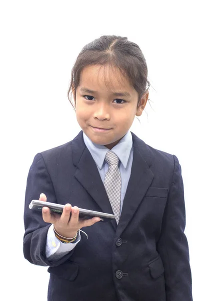 Asian boy in suit dial on mobile phone over white background — Stock Photo, Image