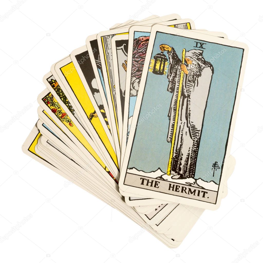 Deck of Tarot cards on white background ; THE HERMIT.
