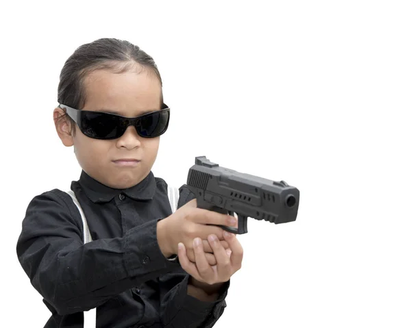 Joven asiático chico con pistola aislar en blanco fondo . — Foto de Stock