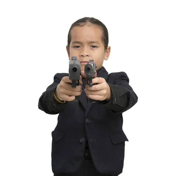 Joven asiático chico con pistola aislar en blanco fondo . — Foto de Stock