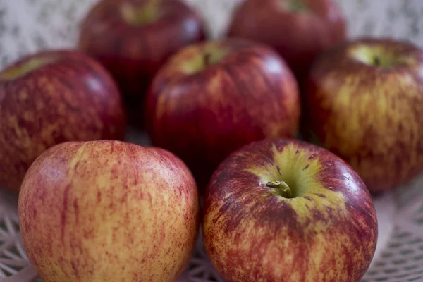 gala apples on wooden table