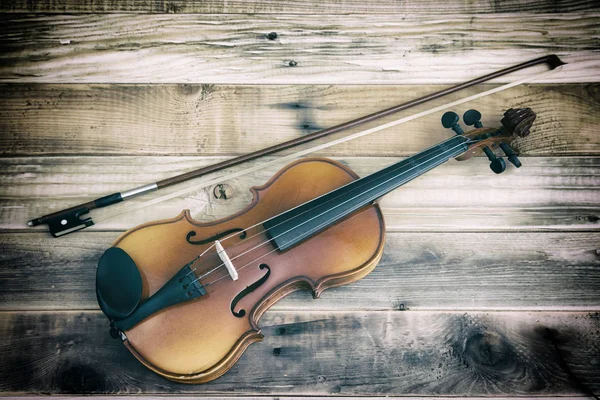 Still life with vintage violin rustic wooden background — Stock Photo, Image