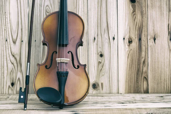 Still life with vintage violin rustic wooden background — Stock Photo, Image