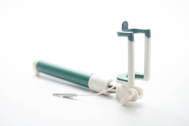 Beyaz arka plan üzerinde izole selfie monopod .