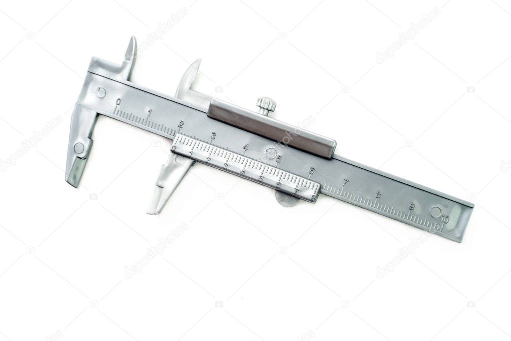 Toy Vernier caliper on white background.