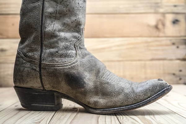 Botas Vaqueras Aisladas Sobre Fondo Madera — Foto de Stock