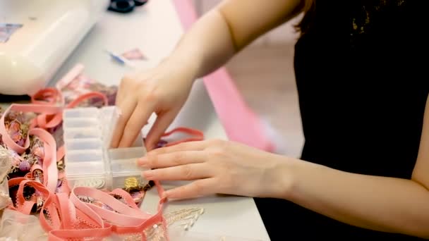 Seamstress chooses fittings. Fashion designer at work. Sewing workshop. woman 30-40 years old — Stock Video