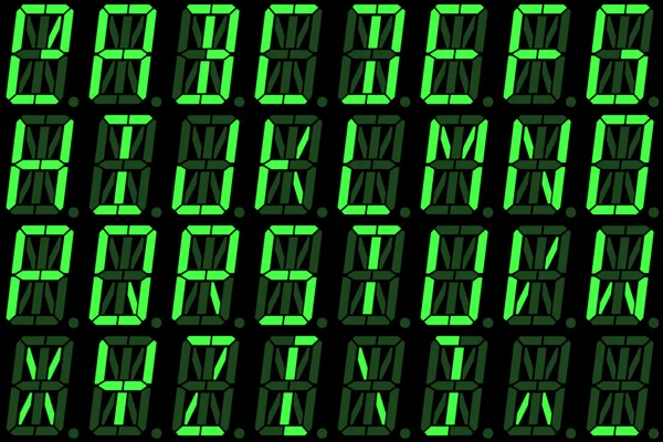 Fonte numérique des lettres majuscules sur l'écran LED alphanumérique vert Photo De Stock