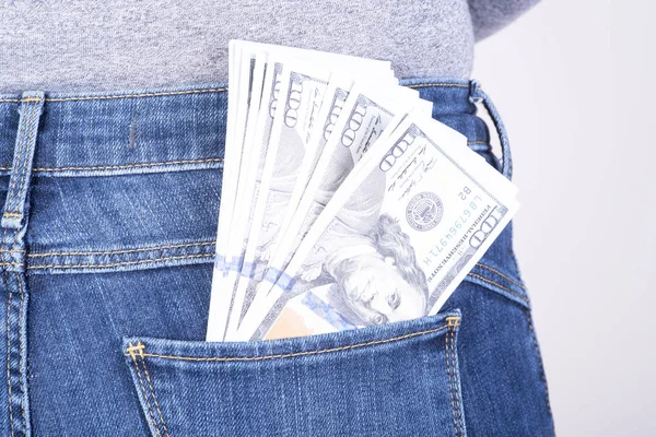 Dollars sticking out of his pants pocket — Stock Photo, Image