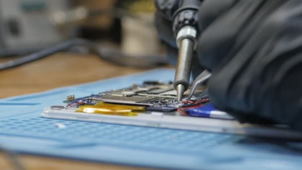 Repair of electronic devices, tin soldering parts — Stock Video