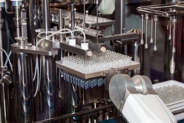 Ampül doldurma ve mühürleme makinesi