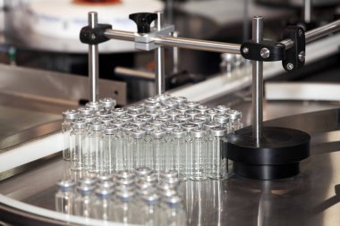 Ampül doldurma ve mühürleme makinesi