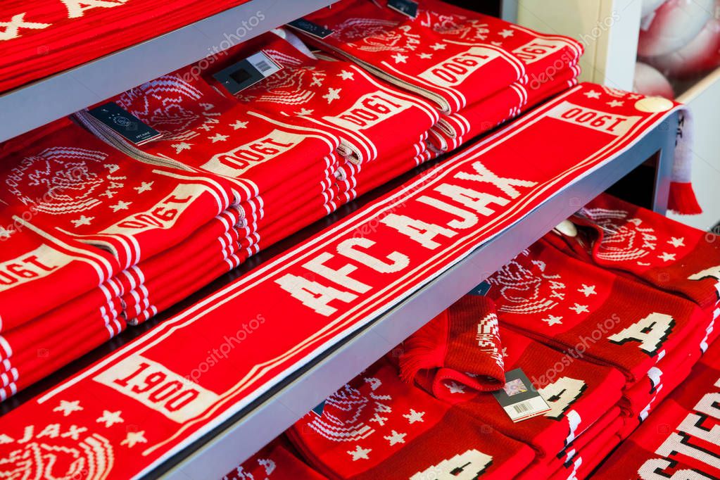 Amsterdam, Netherlands - April, 2017: Ajax fotball club shop interior on Amsterdam Arena, Netherlands. Soccers fan scarves selling