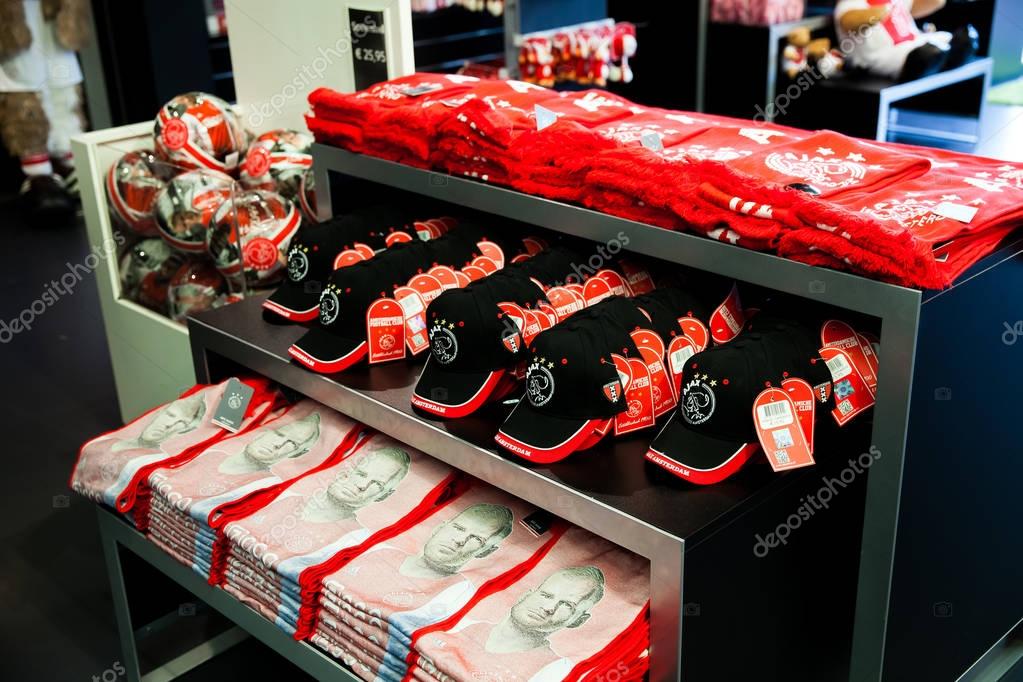 Amsterdam, Netherlands - April, 2017: Ajax fotball club shop interior on Amsterdam Arena, Netherlands. Soccers fan souvenirs