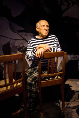 Wax figure of Spanish painter and sculptor Pablo Picasso in Madame Tussauds Wax museum in Amsterdam, Netherlands clipart