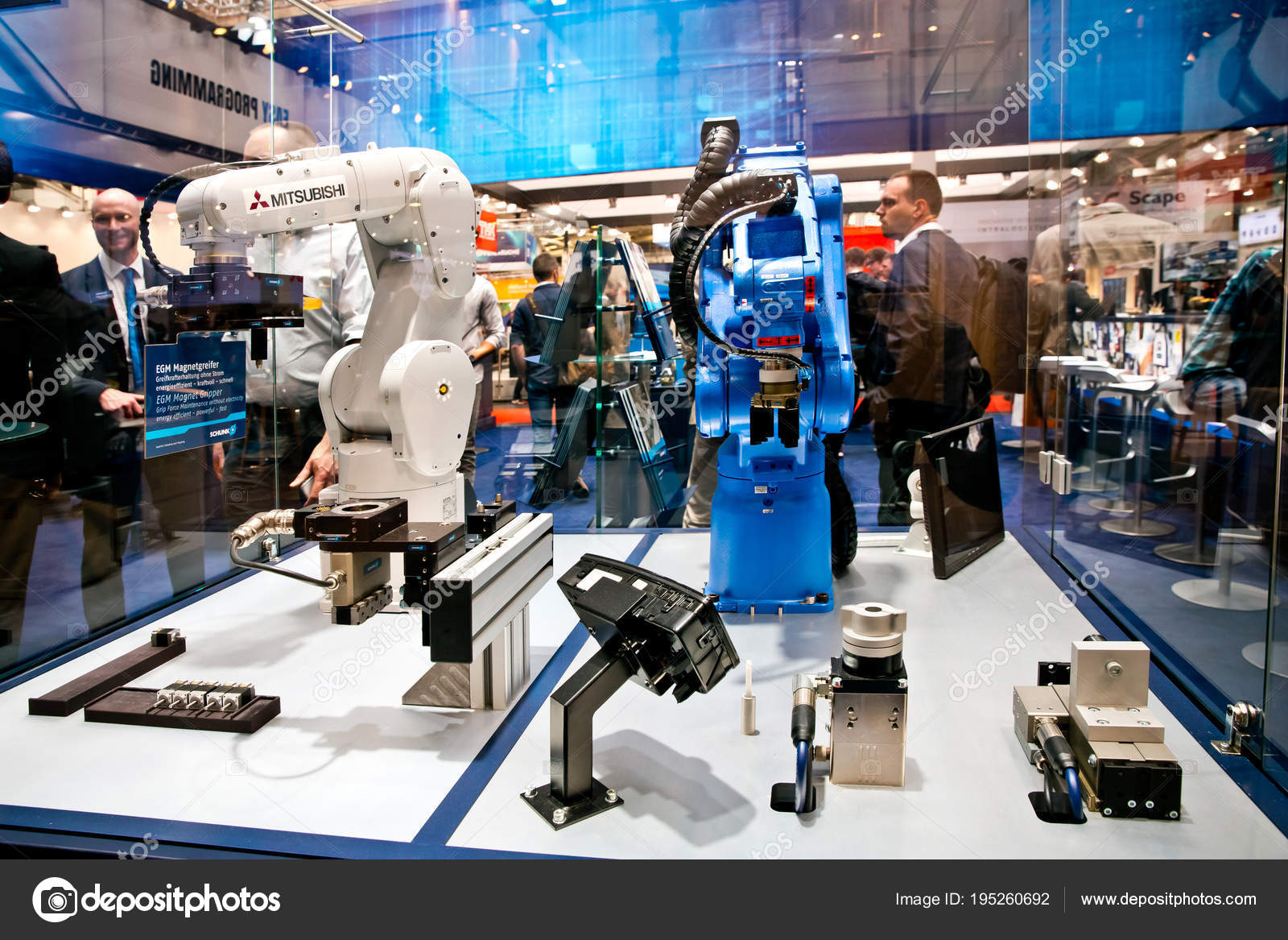 and robot arms on stand on Messe in Hannover, Germany – Stock Editorial Photo © prescott10 #195260692