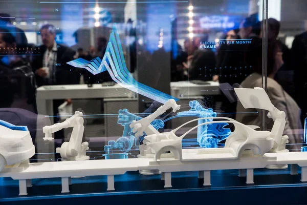 Szimuláló autó gyártási, a robotok a Siemens állni a Messe vásár, Hannover, Németország — Stock Fotó