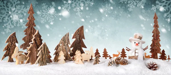 Wooden decoration as a cute winter scene — Stock Photo, Image